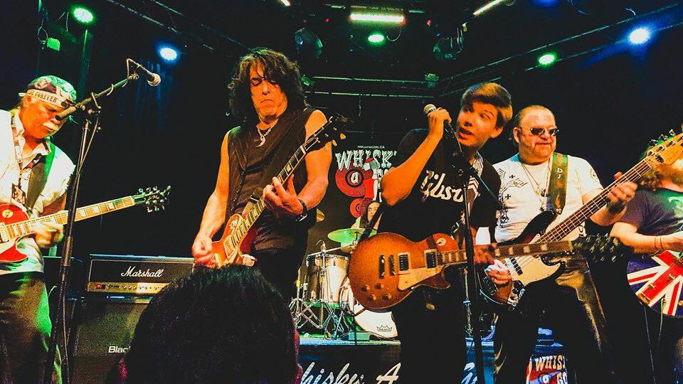 Paul Stanley jamming with campers.